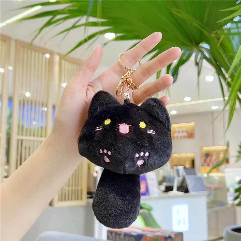 Söt kattnyckelring med plysch och pipsvans -  kawaii accessoar - Image 4